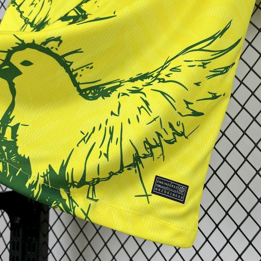 Leazofoot Brazil 23/24 soccer jersey in bright yellow with green bird graphic print and authentic engineered tag.