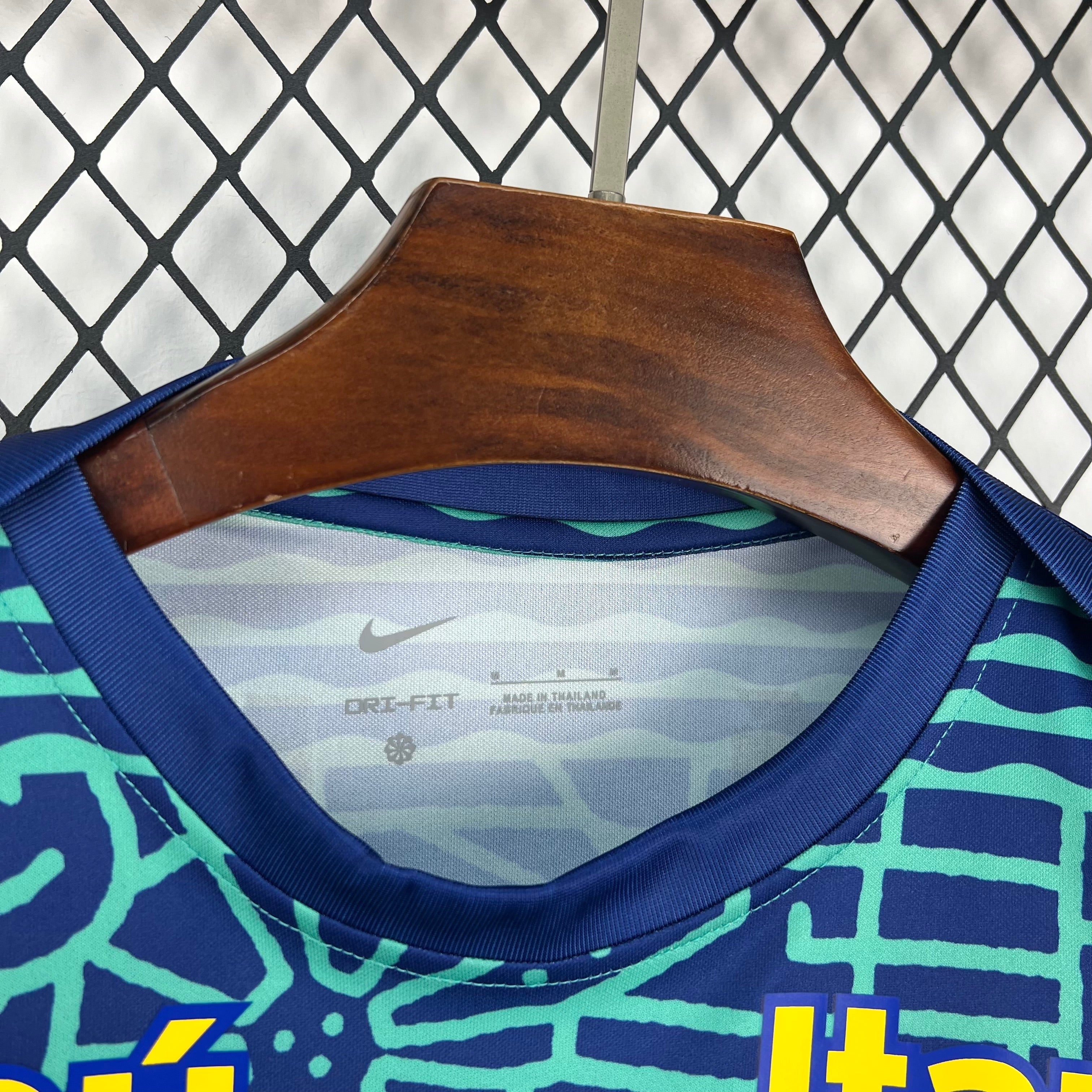 Leazofoot BRÉSIL 2026 pre-match football jersey, blue with teal graphic pattern, crew neck, Dri-FIT fabric.