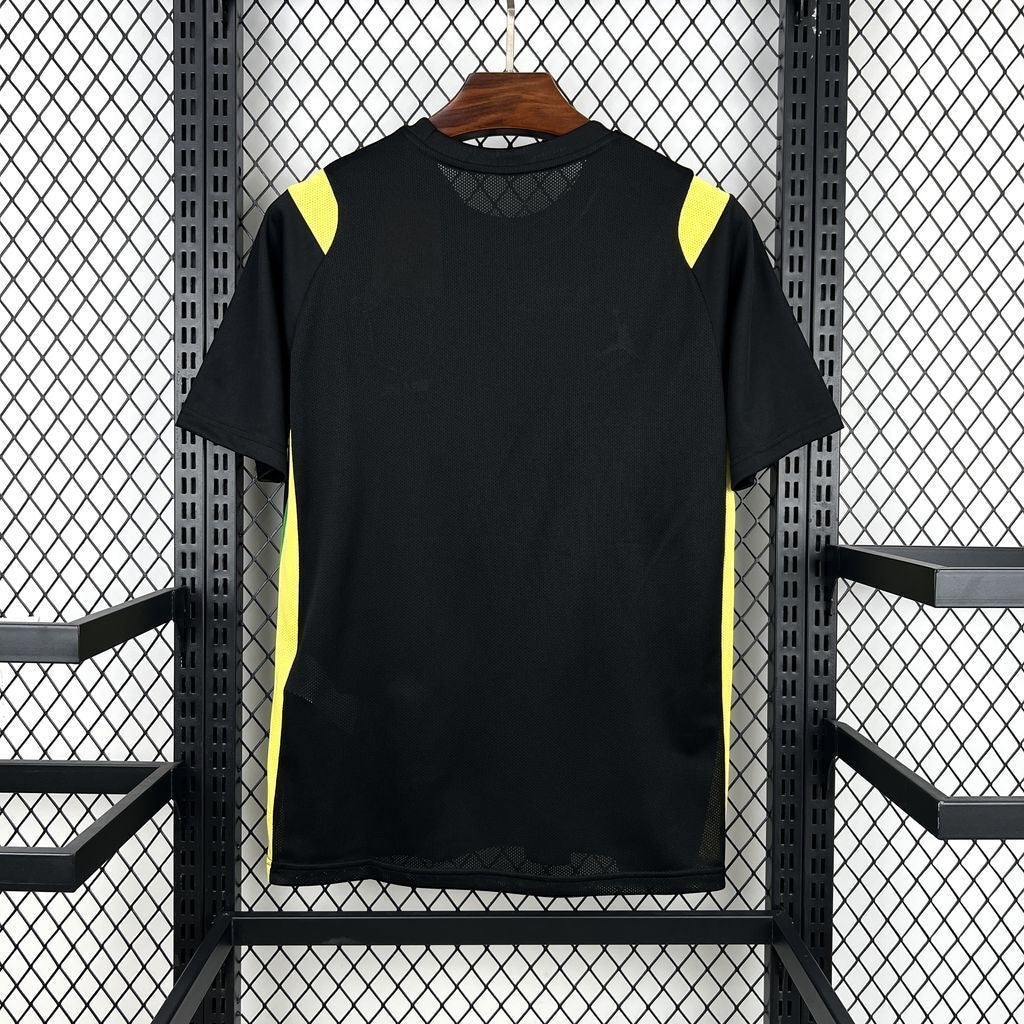 Leazofoot BRÉSIL 2026 pre-match football jersey, black with yellow accents on shoulders and sides.