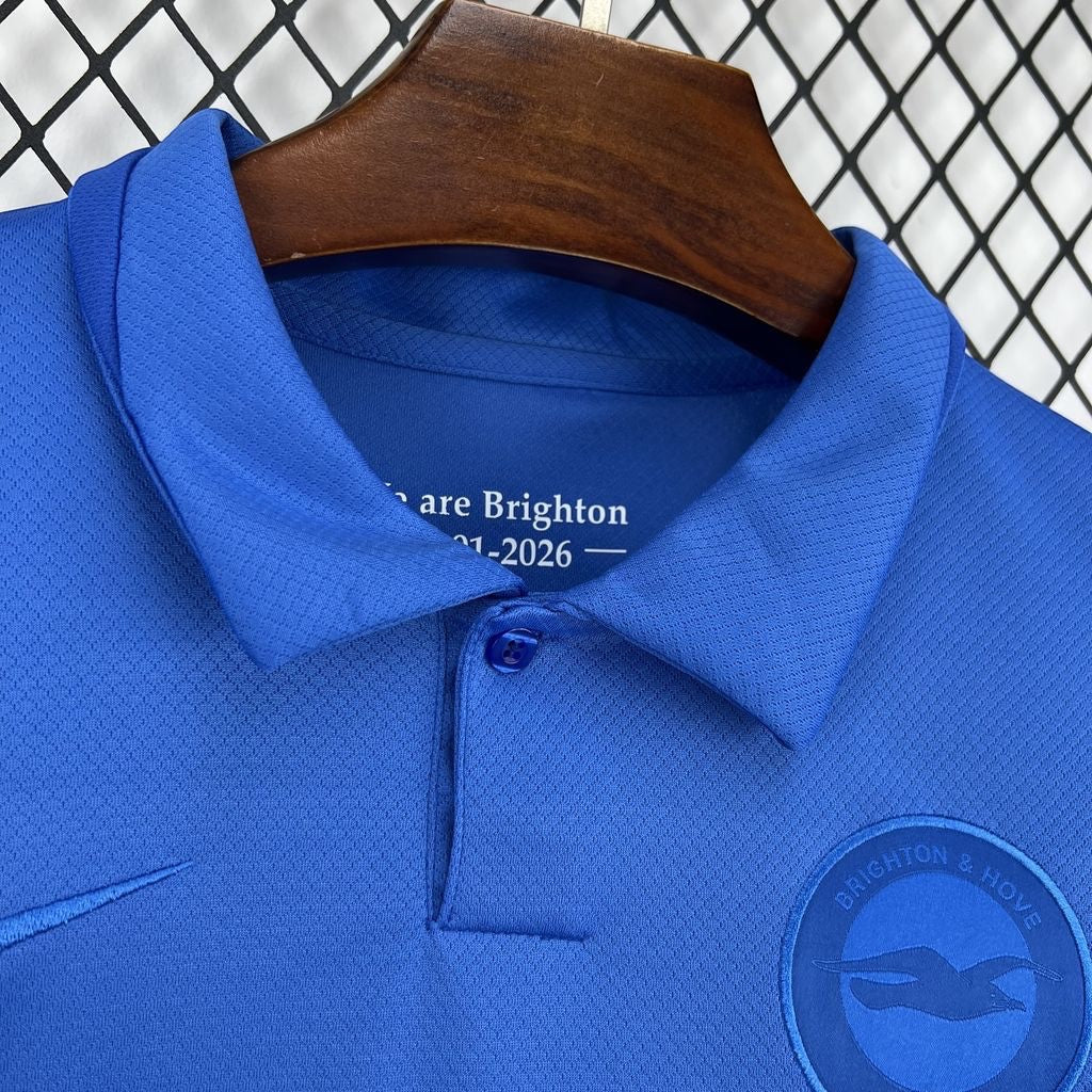Leazofoot Brighton 125th anniversary blue football jersey with collar and team crest detail.