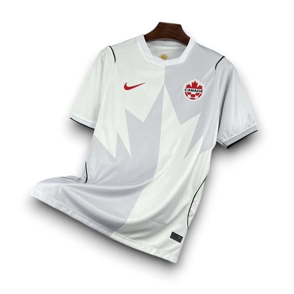 Leazofoot Canada 2026 third soccer jersey in white and grey with a maple leaf graphic and red Nike swoosh logo.