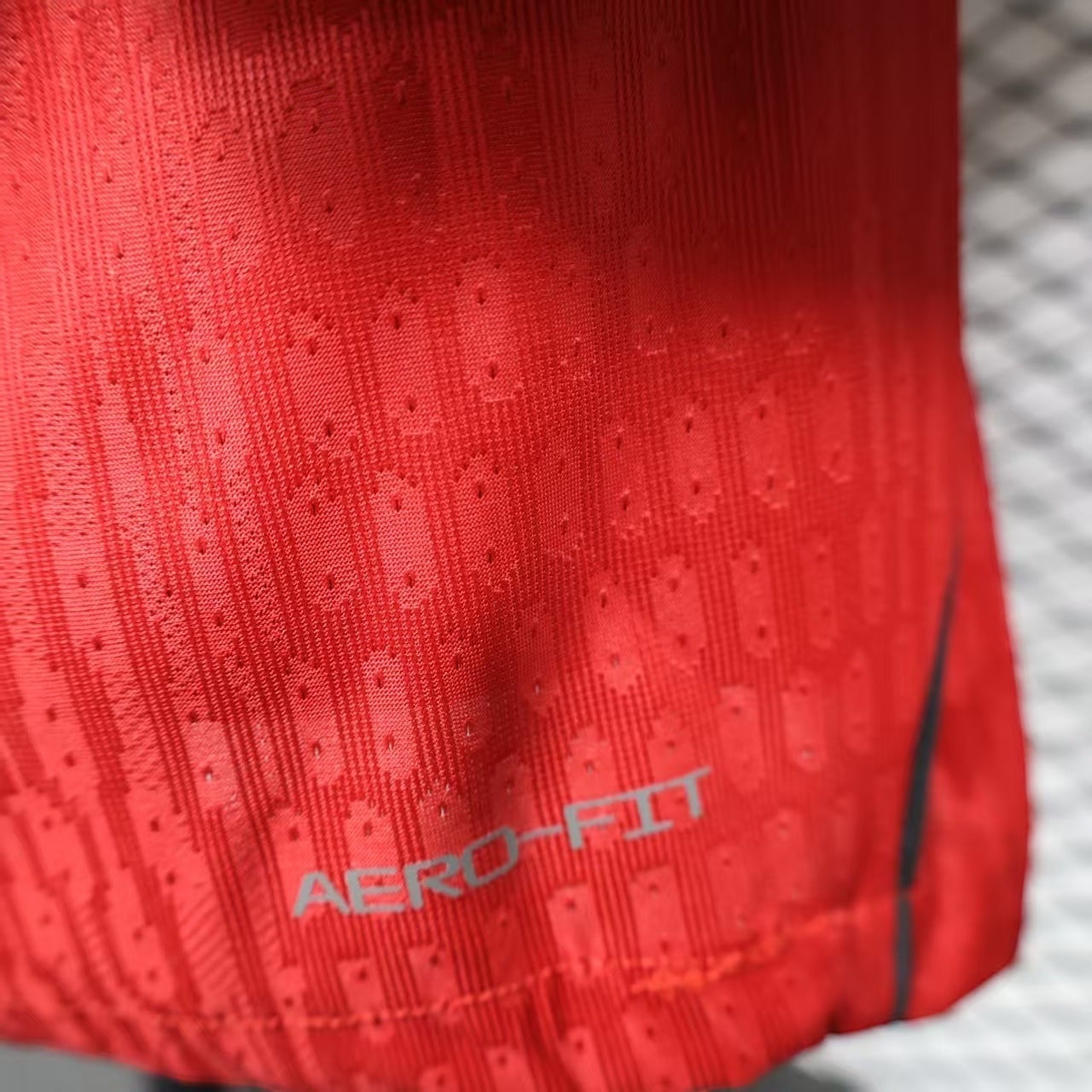 Leazofoot red Canada Soccer jersey with Aero-Fit technology and maple leaf graphic detail.