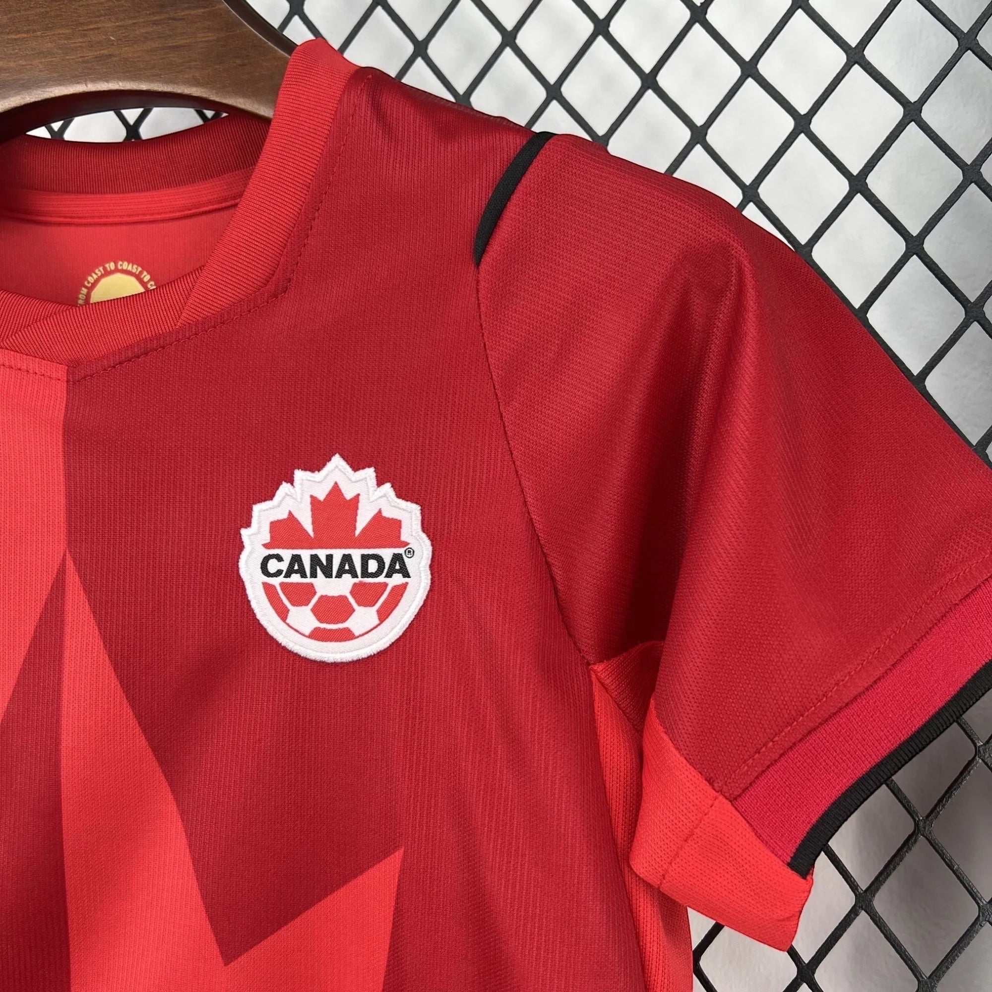 Leazofoot Canada Soccer National Team red jersey with maple leaf emblem and graphic design. Breathable fabric.