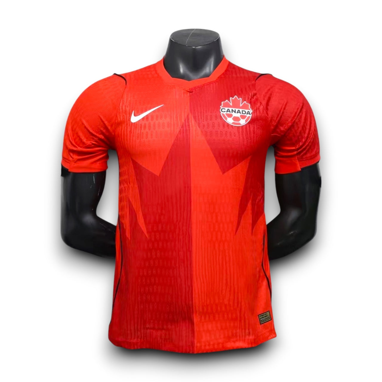 Leazofoot red Canada Soccer jersey with maple leaf graphic, Nike Swoosh, and Canada Soccer crest. Lightweight, breathable fabric.
