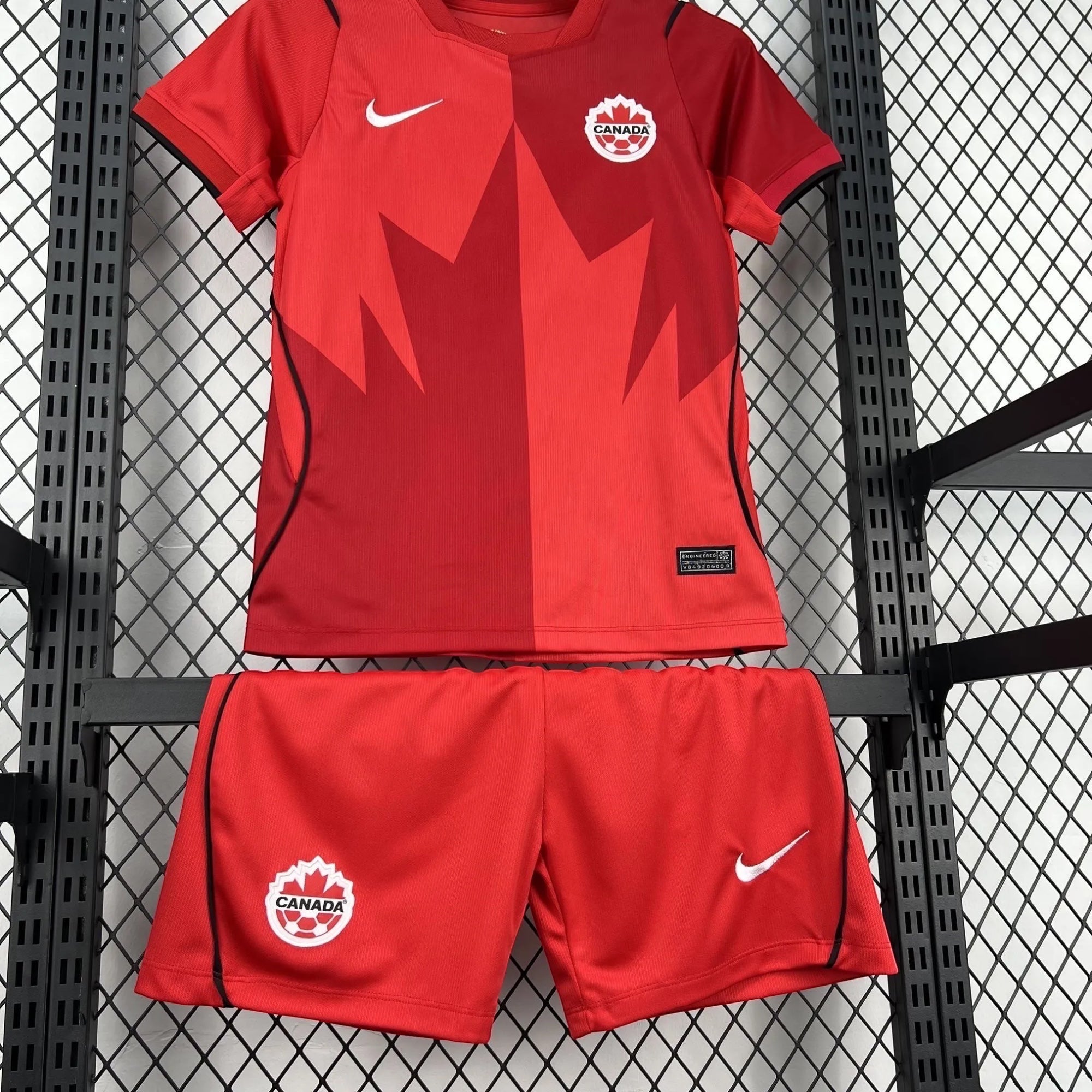 Leazofoot Canada Soccer National Team red jersey and shorts set with maple leaf graphic and Nike logo.
