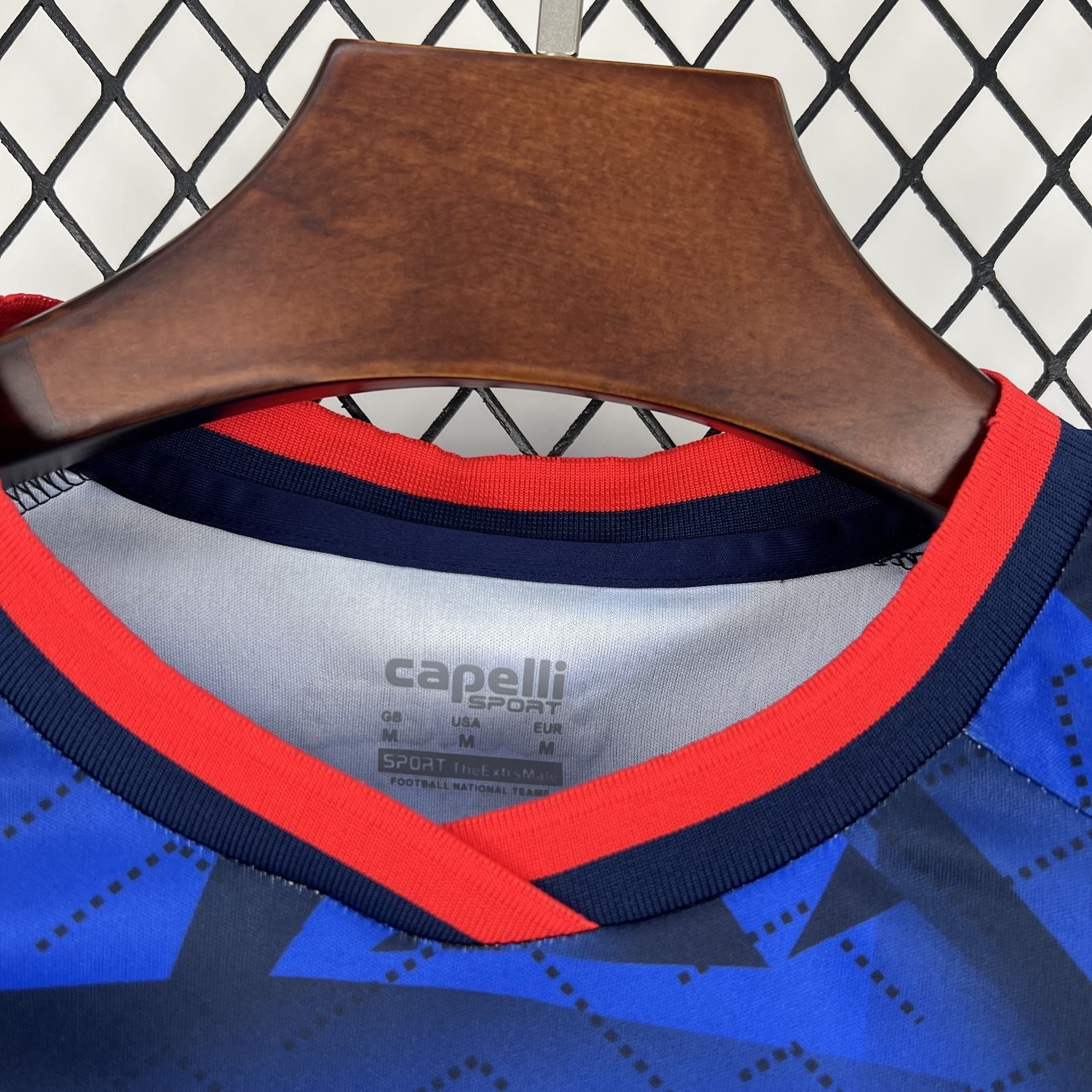 Leazofoot CAP-VERT 2026 home football jersey with blue, red, and navy accents.