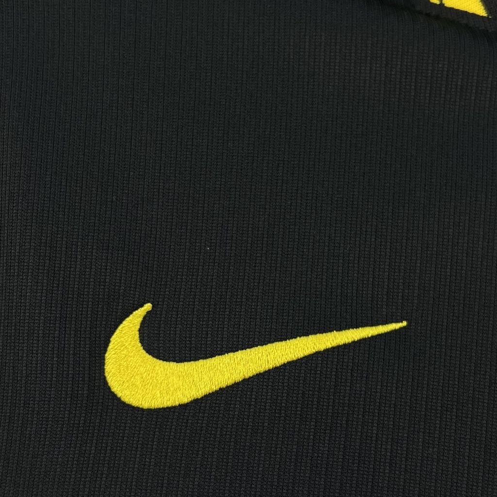 Leazofoot Chelsea 26/27 away jersey featuring a black textured fabric with an embroidered yellow Nike swoosh logo.