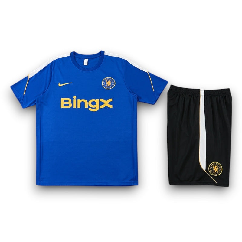 Leazofoot Chelsea 26/27 training kit featuring a blue jersey with gold sponsor logo and black athletic shorts
