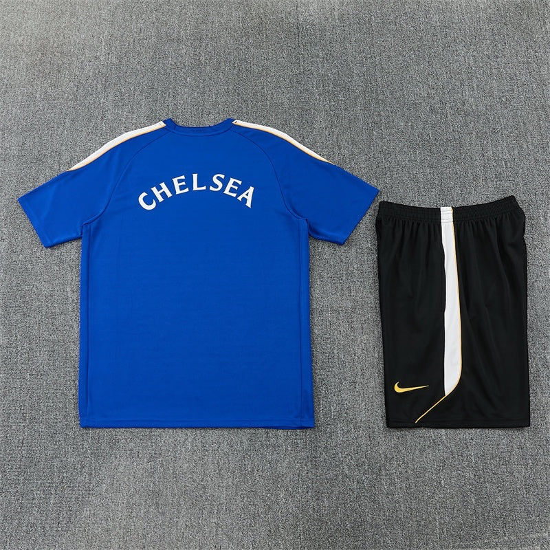 Leazofoot Chelsea 26/27 training kit with blue jersey featuring white lettering and black shorts with gold accents