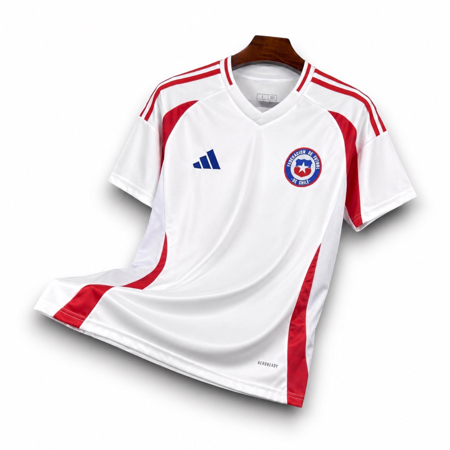Leazofoot Chile 2024 away soccer jersey in white with red side panels and blue logo details on a wooden hanger.
