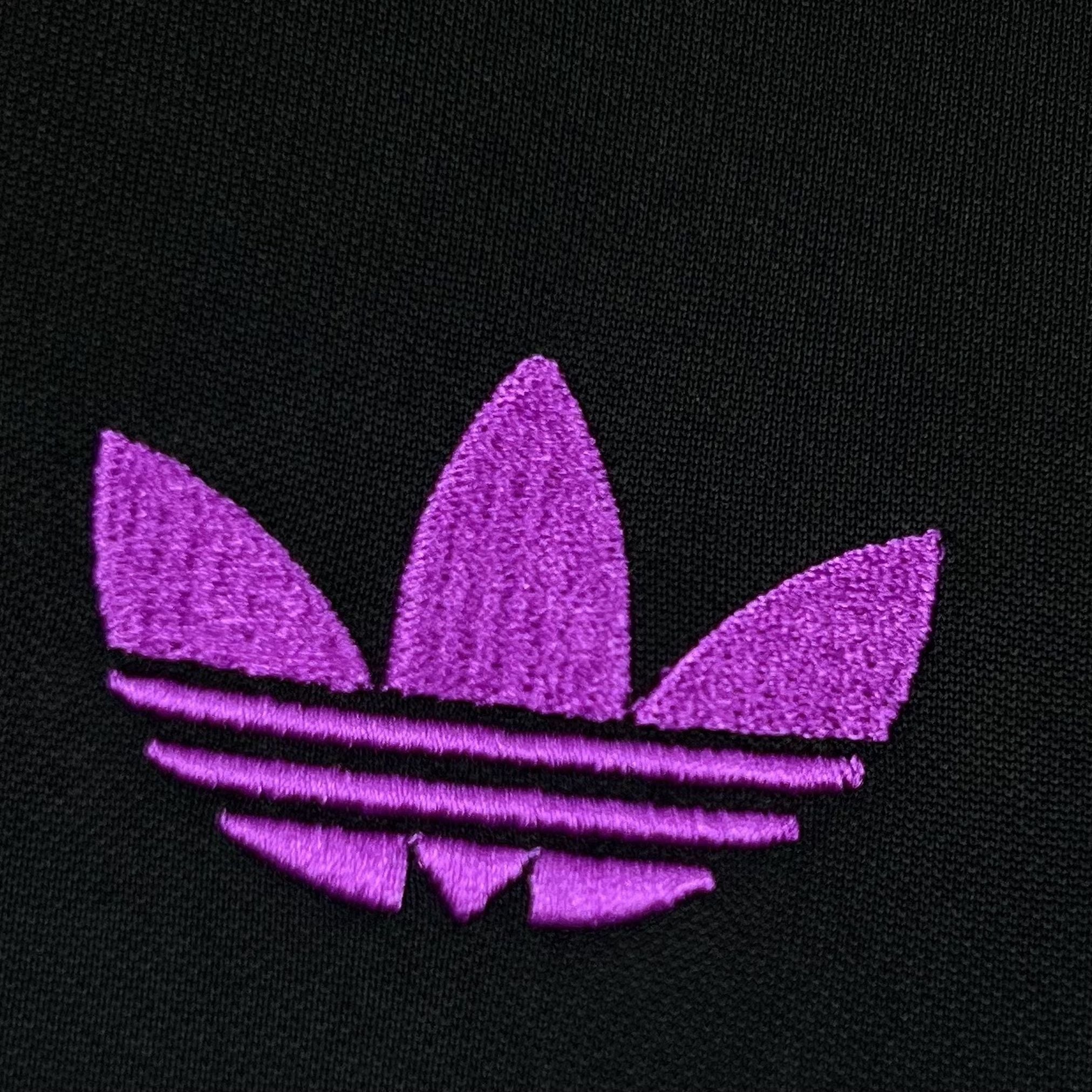 Leazofoot Chili 2026 concept jersey featuring a vibrant purple embroidered trefoil logo on a black textured fabric.