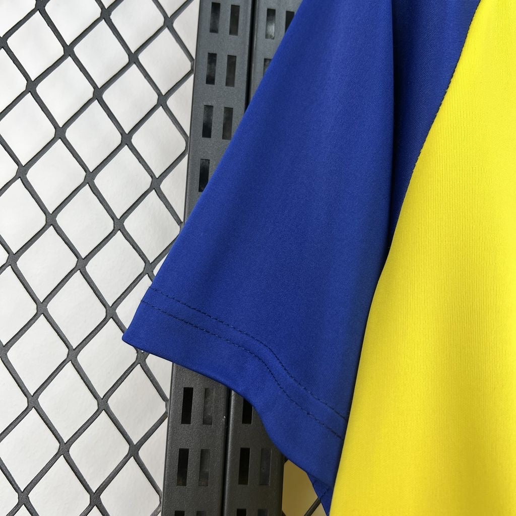 Leazofoot Colombia 2026 pre-match soccer jersey featuring yellow and blue color-blocked design.