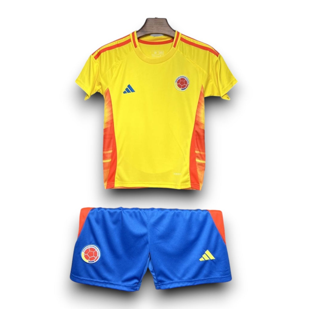 Leazofoot Colombia home football kit featuring a yellow jersey with red accents and blue shorts with team crest.