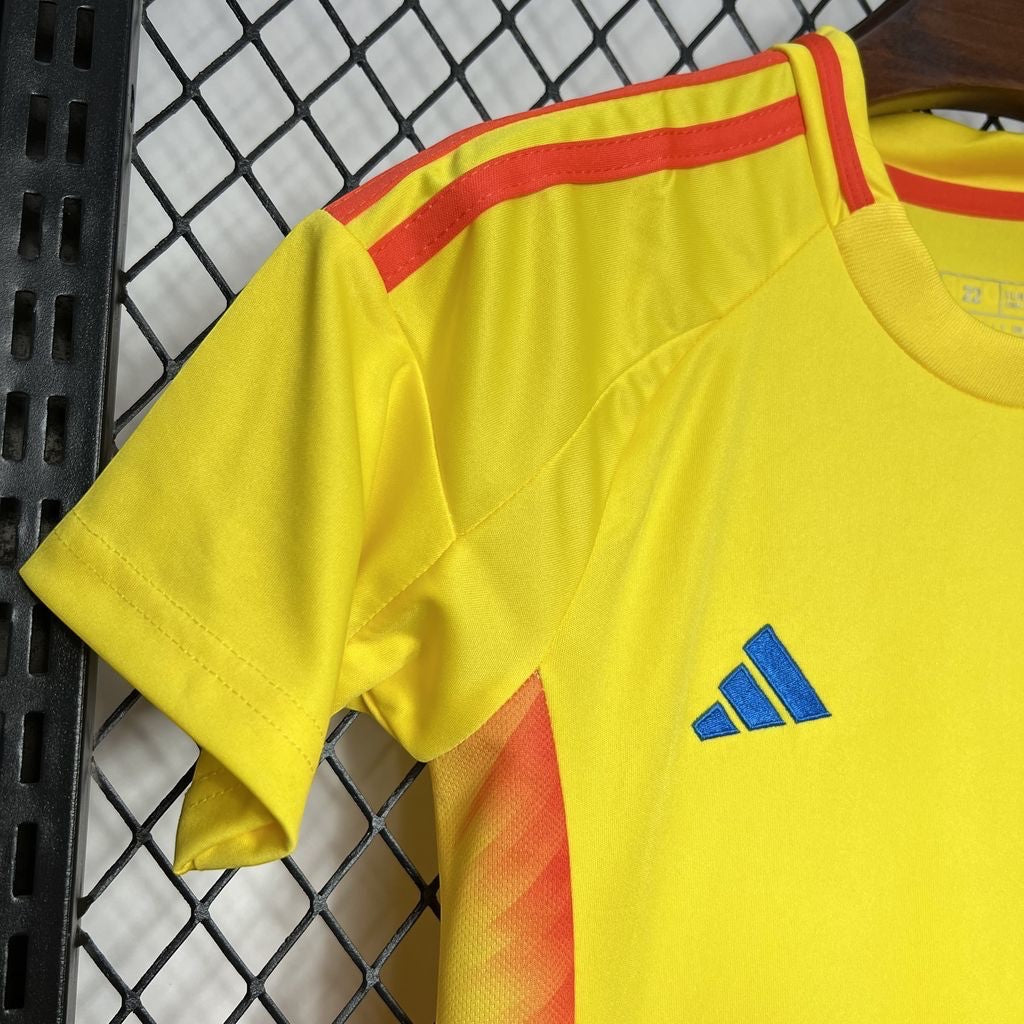 Leazofoot Colombia home football jersey in yellow with red shoulder stripes and blue logo detail.