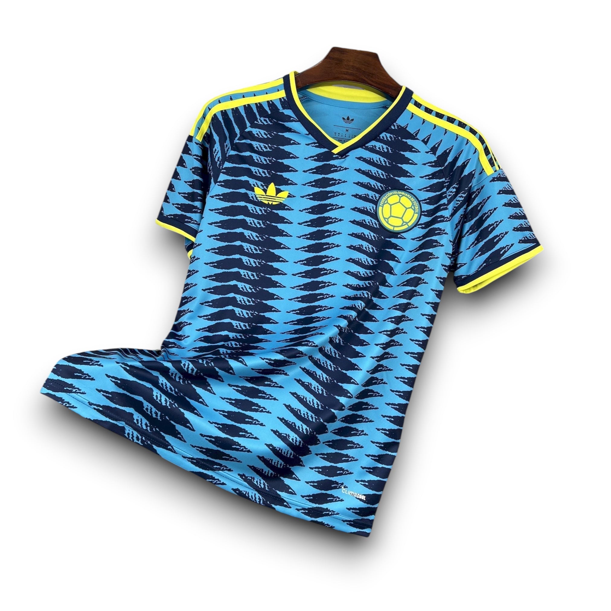 Leazofoot COLOMBIE 2026 men's blue and navy graphic soccer jersey with yellow trim.