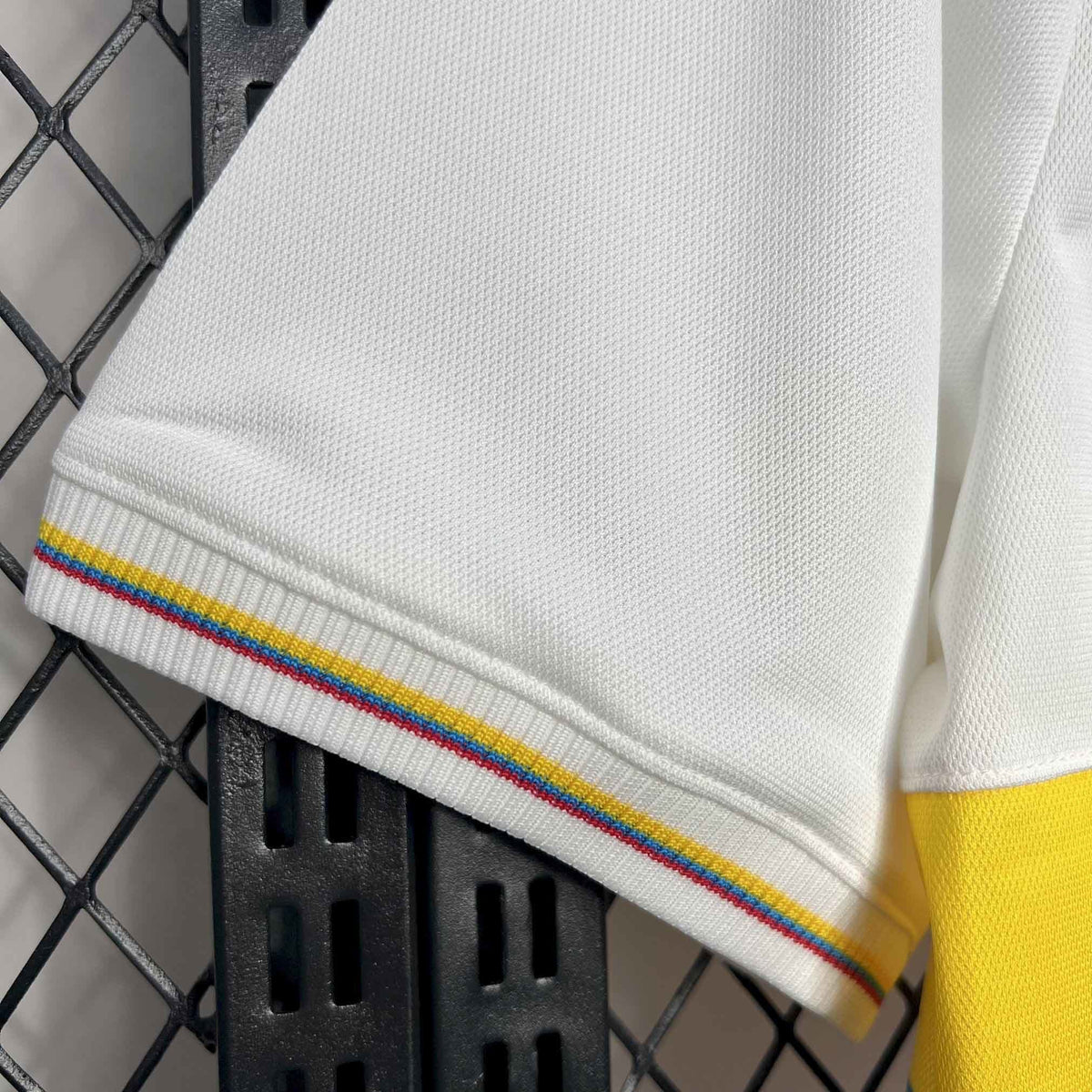 Leazofoot Colombia 100th anniversary special edition jersey sleeve with white textured fabric and tricolor trim.