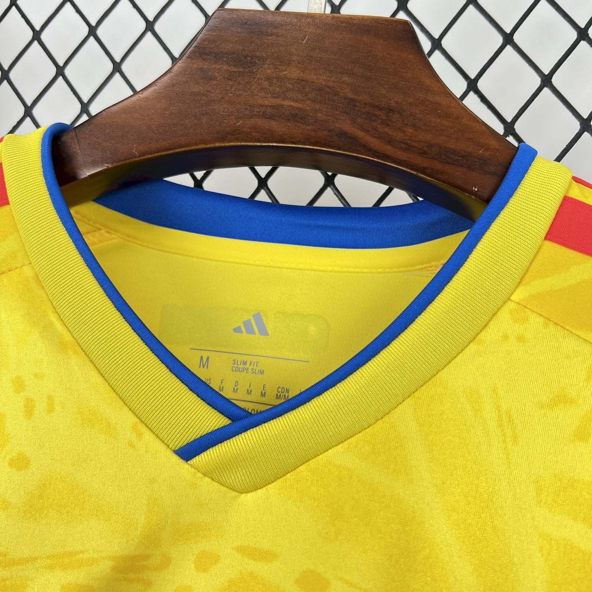 Leazofoot COLOMBIE home long sleeve jersey 2026, yellow with blue trim and red accents on shoulders.