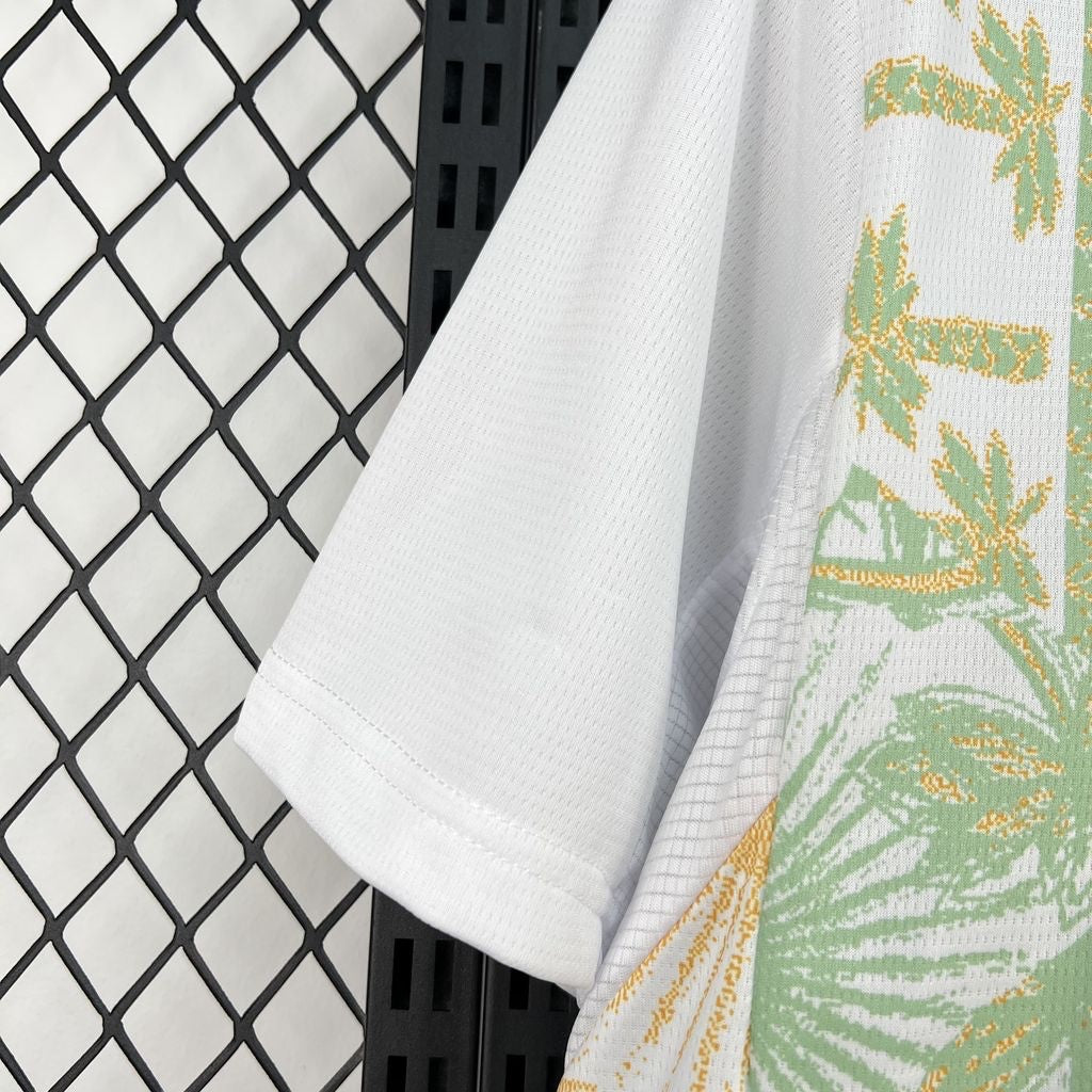 Leazofoot Côte d'Ivoire 2026 away jersey featuring a white performance fabric with green and yellow palm tree print.
