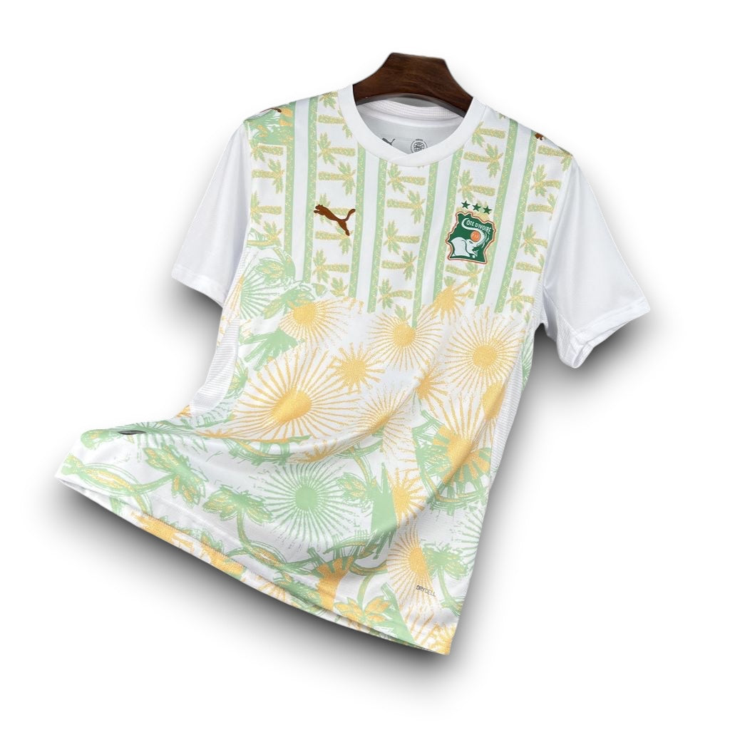 Leazofoot Côte d'Ivoire 2026 away football jersey in white with green palm and yellow floral graphic print details.