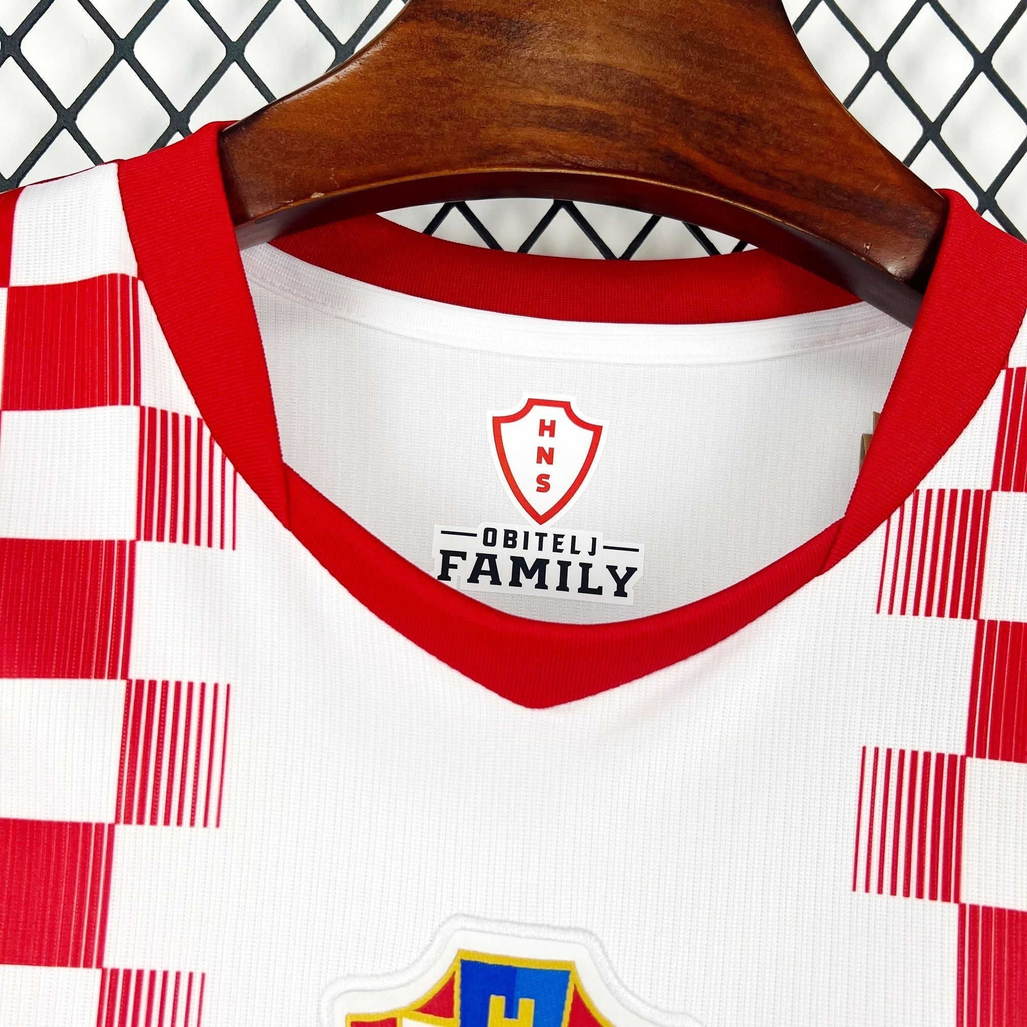 Leazofoot Croatia home soccer jersey 2026 with red and white checkerboard pattern and red collar.