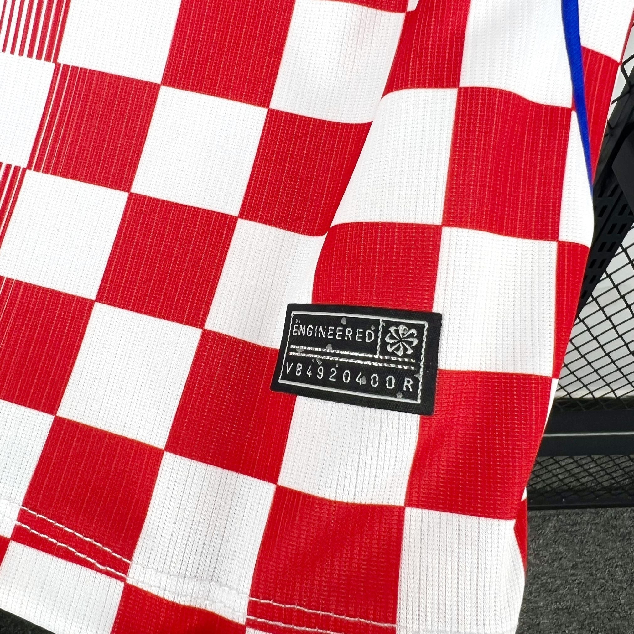 Leazofoot Croatia home soccer jersey 2026 with red and white checkerboard pattern and engineered tag.