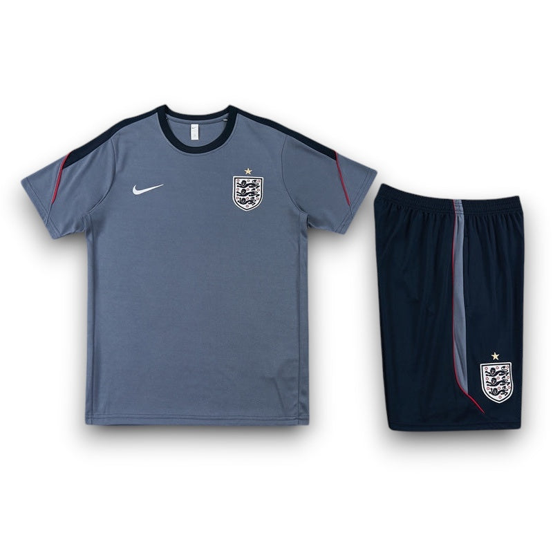 Leazofoot England 2026 training set featuring a grey t-shirt and navy shorts with team crests and Nike branding.