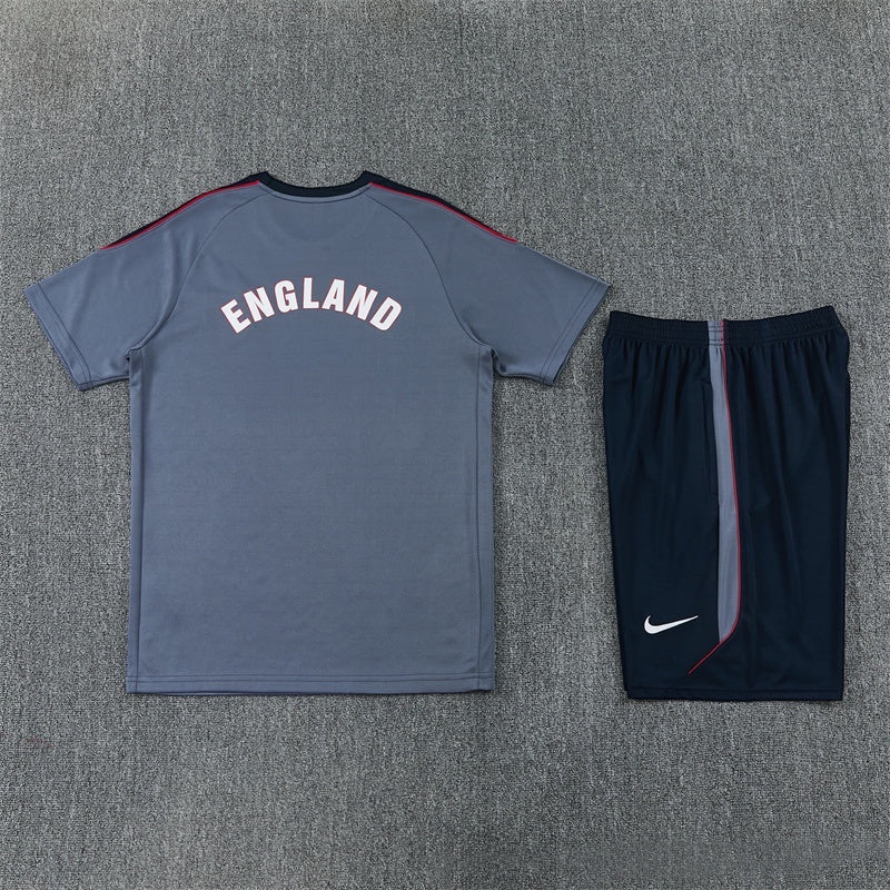 Leazofoot England 2026 training set featuring a grey t-shirt with England text and matching navy blue athletic shorts.