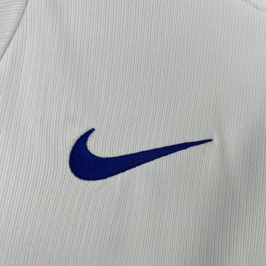 Leazofoot Finland 2026 home jersey featuring a white textured fabric with an embroidered blue Nike swoosh logo.