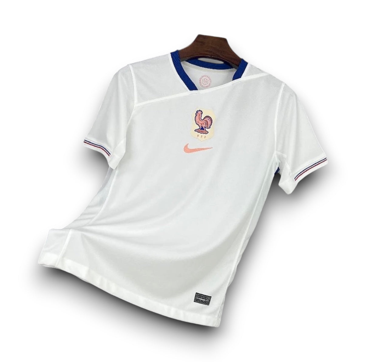 Leazofoot France 2025 away jersey in white with blue collar trim and central crest detail on a wooden hanger