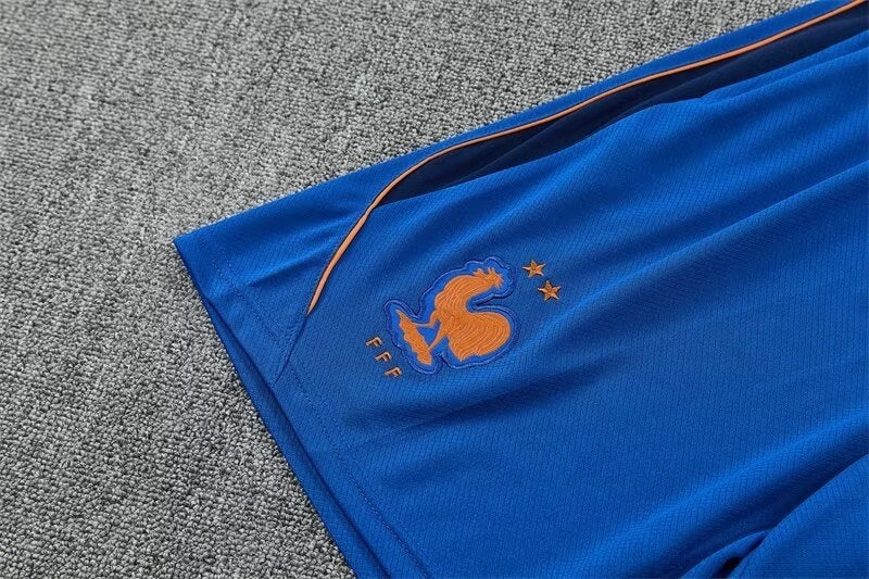 Leazofoot France 2026 training shorts in blue with orange trim and embroidered FFF rooster logo