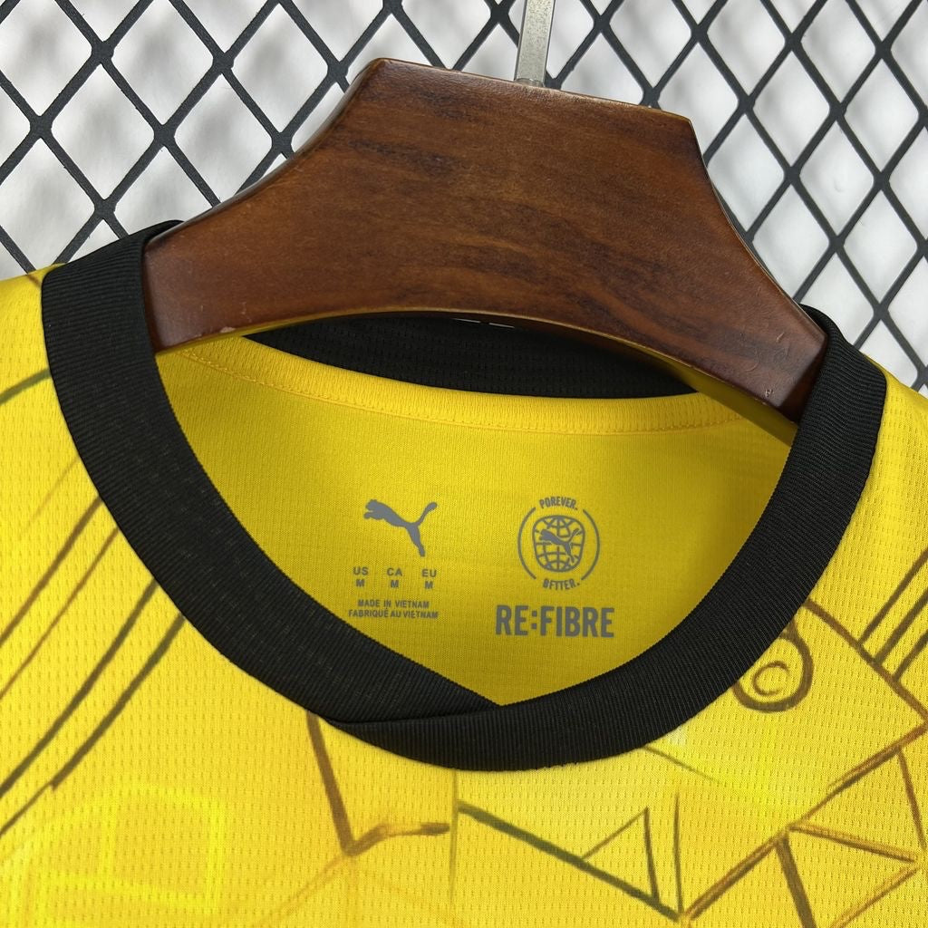 Leazofoot Ghana 2026 away football jersey in yellow with black trim and RE:FIBRE sustainable fabric details.