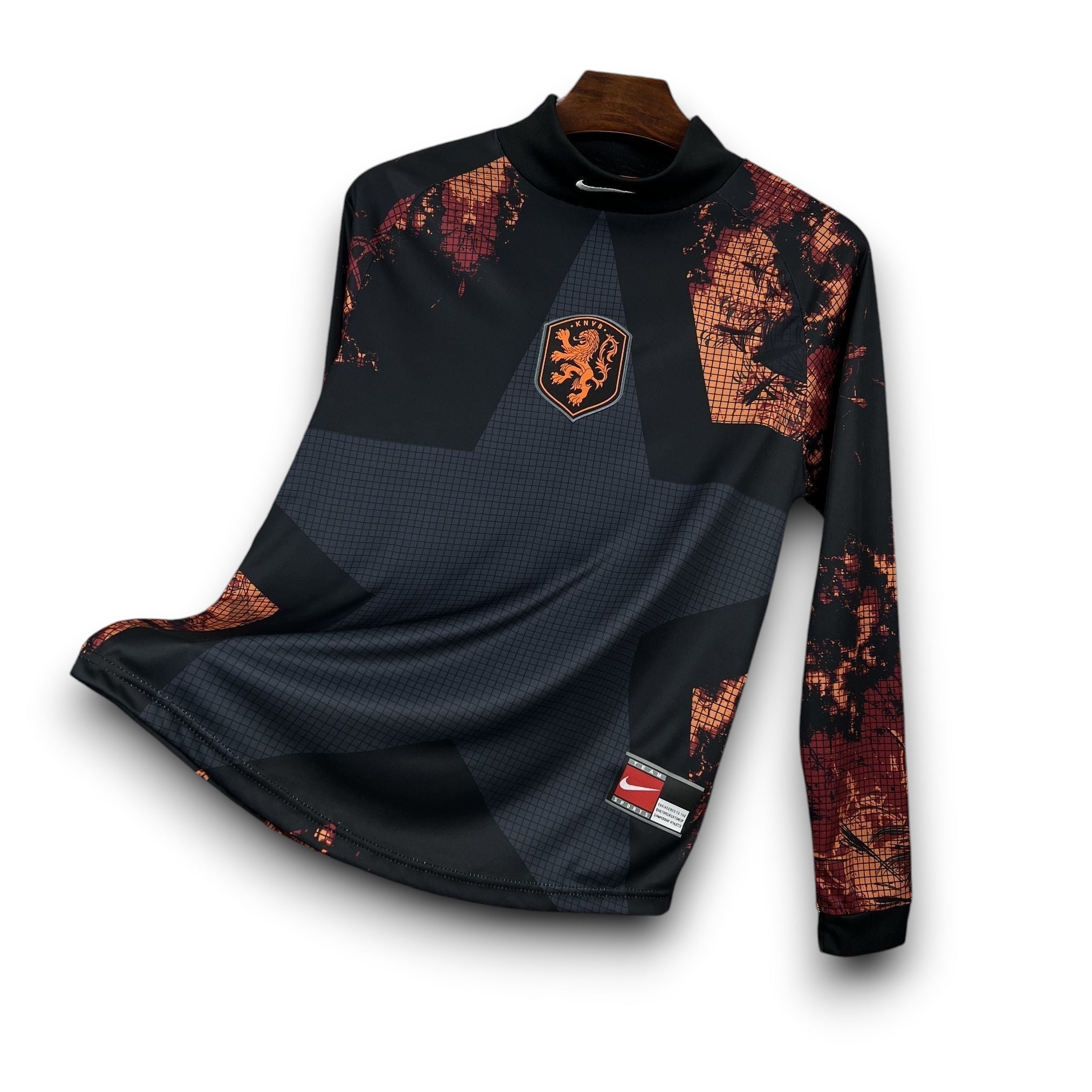Leazofoot black long-sleeve goalkeeper jersey with orange graphic details and Netherlands crest.