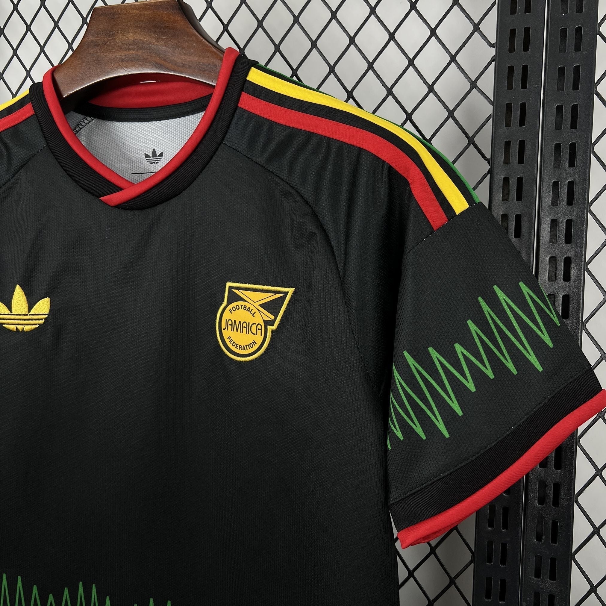 Leazofoot Jamaica 2026 away football jersey in black with red, yellow, and green accents and embroidered team crest.