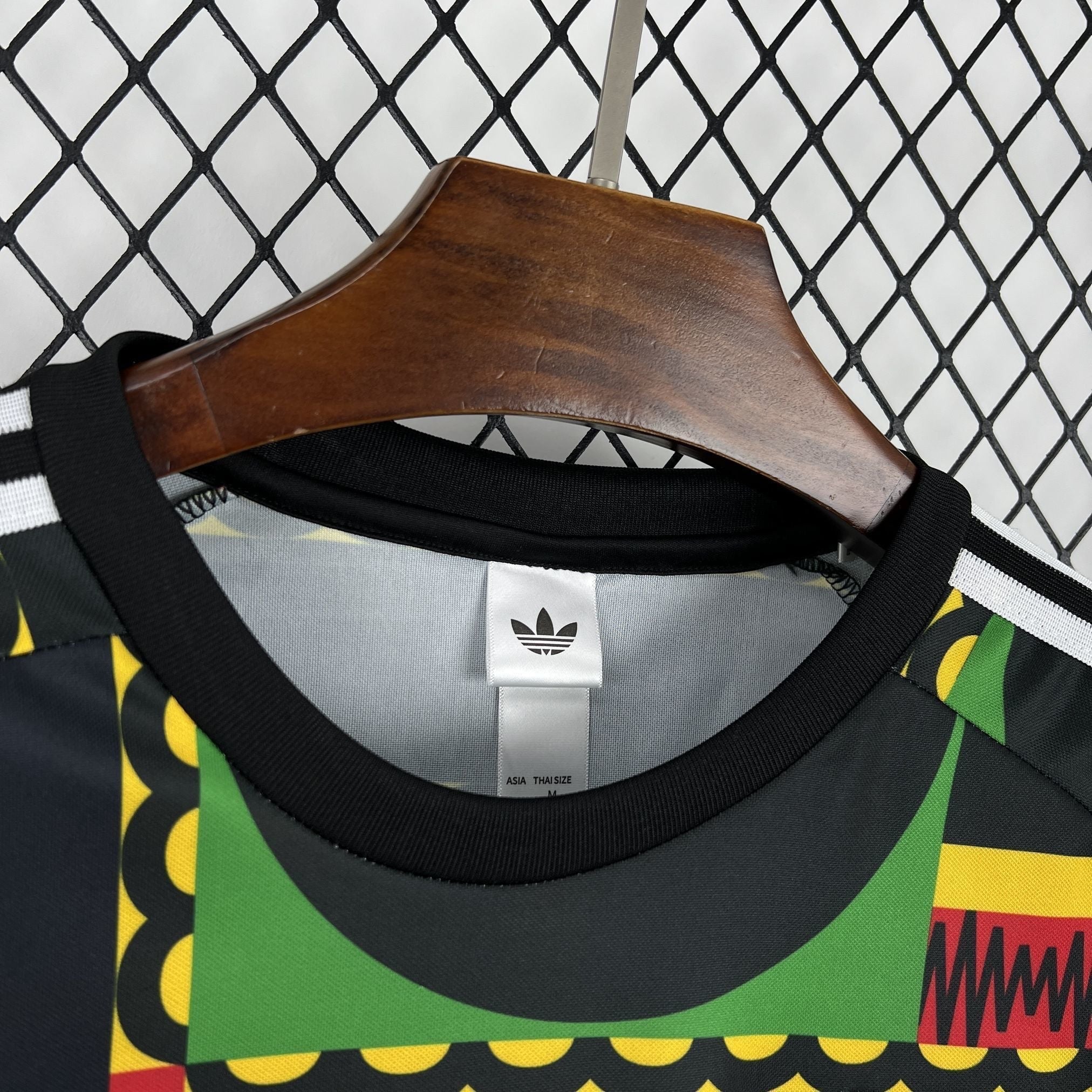 Leazofoot Jamaica 2026 concept soccer jersey featuring a black, green, yellow, and red geometric pattern.