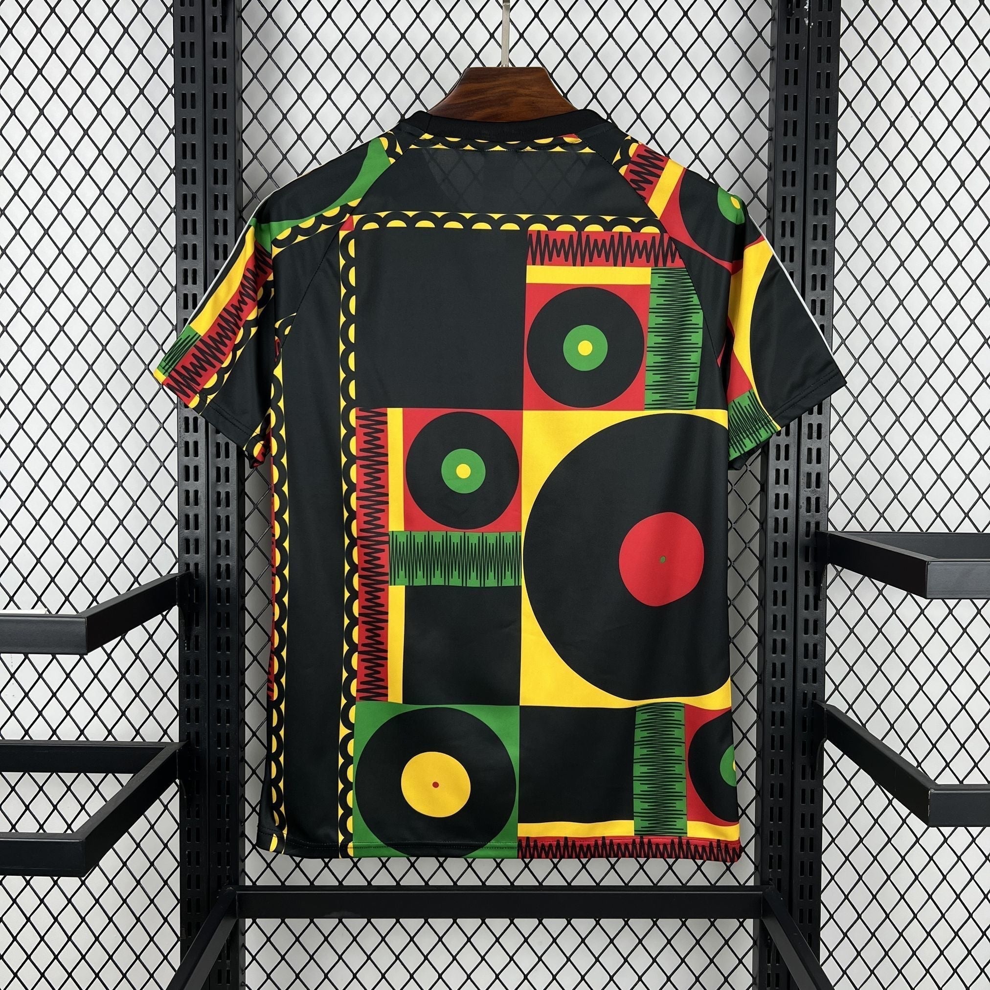 Leazofoot Jamaica 2026 concept football jersey featuring a black, red, yellow, and green geometric vinyl record print.