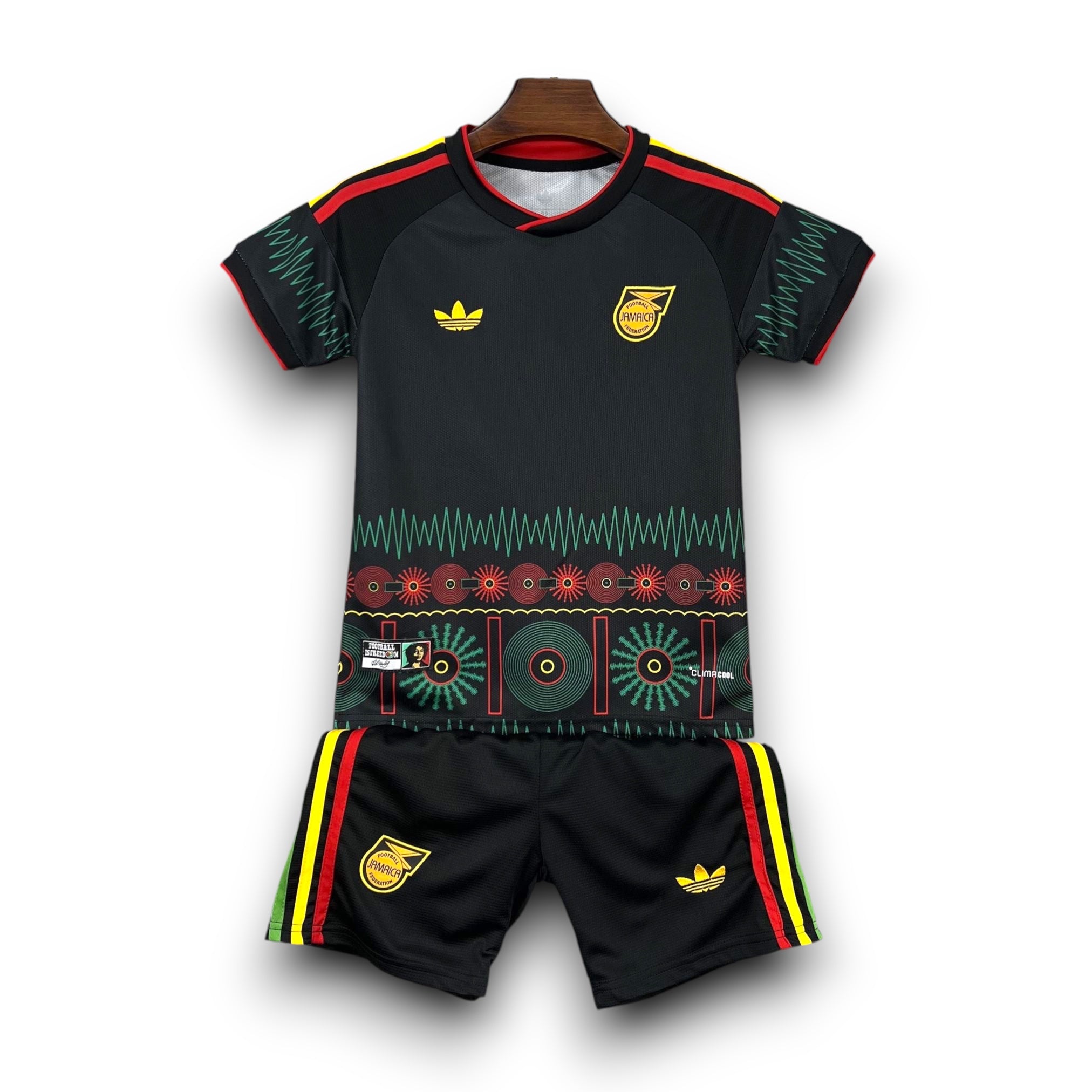 Leazofoot Jamaica 2026 kids away football kit in black with green, yellow, and red graphic patterns and logos.