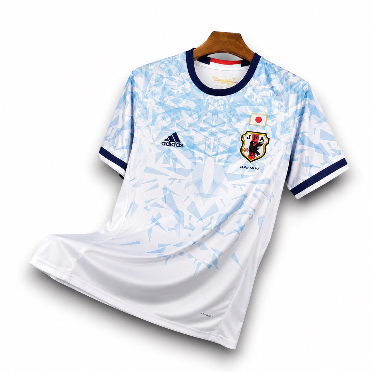Leazofoot Japan 2016-2017 away football jersey in white with blue geometric pattern and Adidas logo on hanger