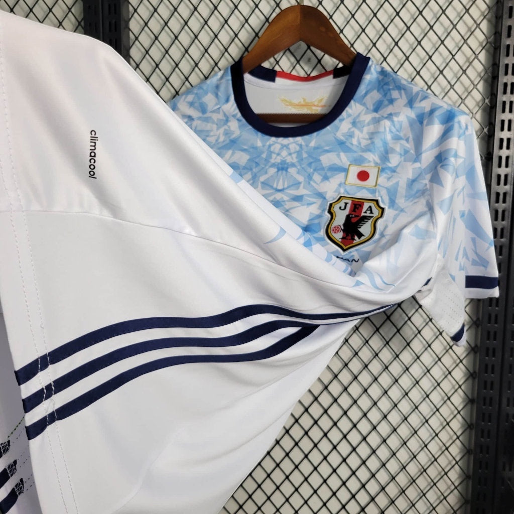Leazofoot Japan 2023 soccer jersey in white with blue geometric pattern, JFA crest, and Climacool fabric technology.