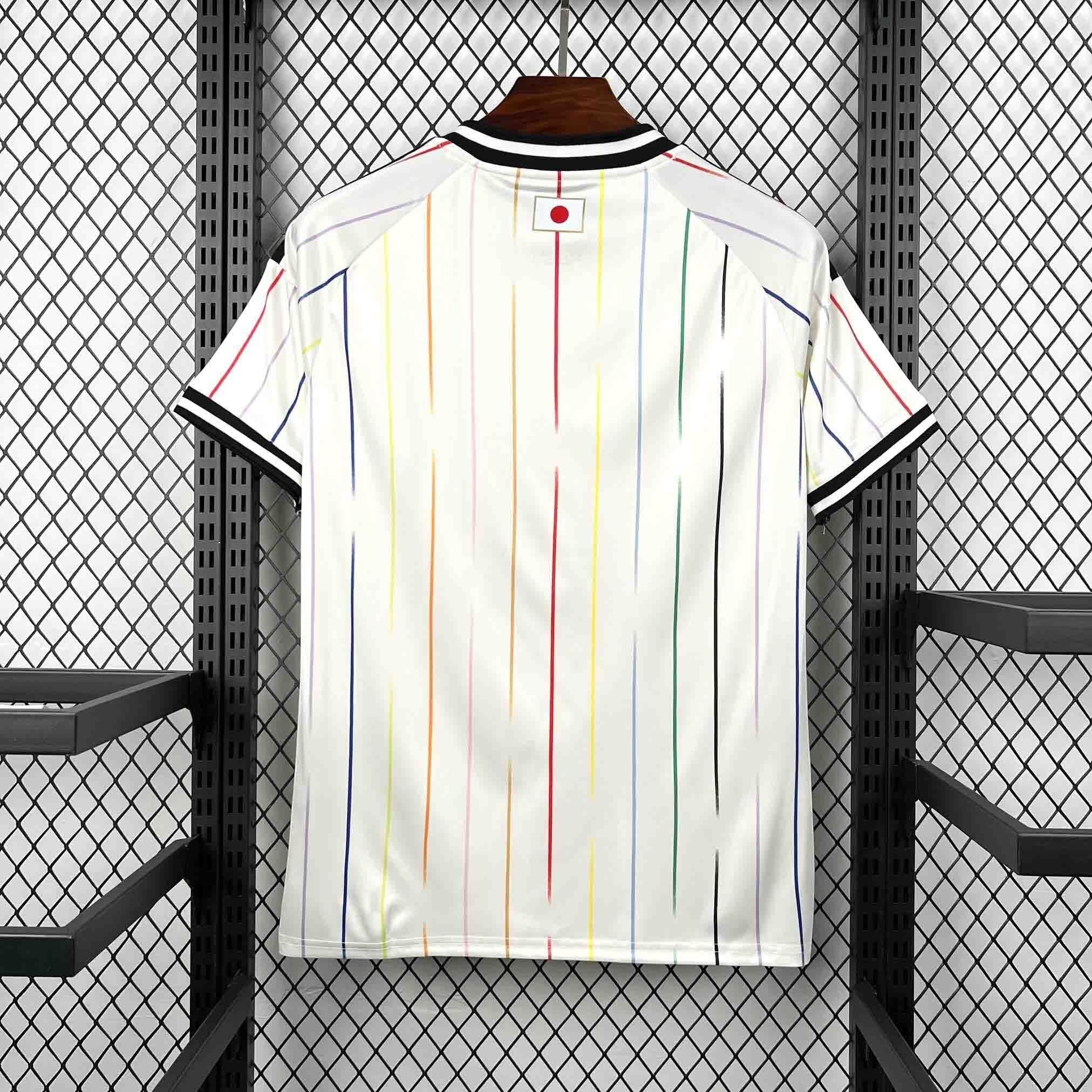 Leazofoot Japan 2026 away jersey with vertical rainbow stripes and black trim on collar and sleeves.
