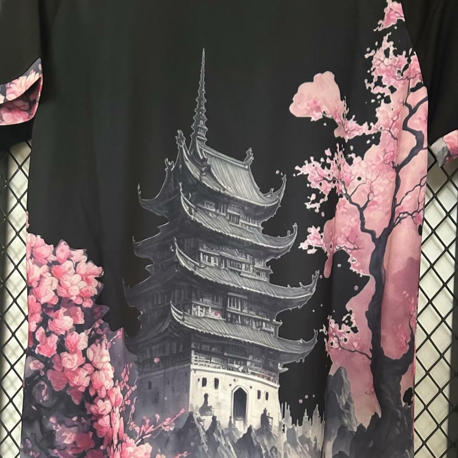 Leazofoot Japan concept jersey featuring a black background with a detailed pagoda and pink cherry blossom print.