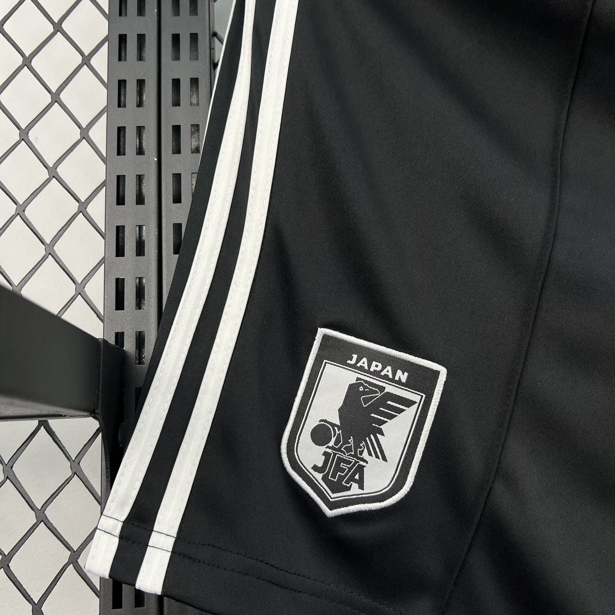 Leazofoot black shorts with white stripes and Japan JFA crest