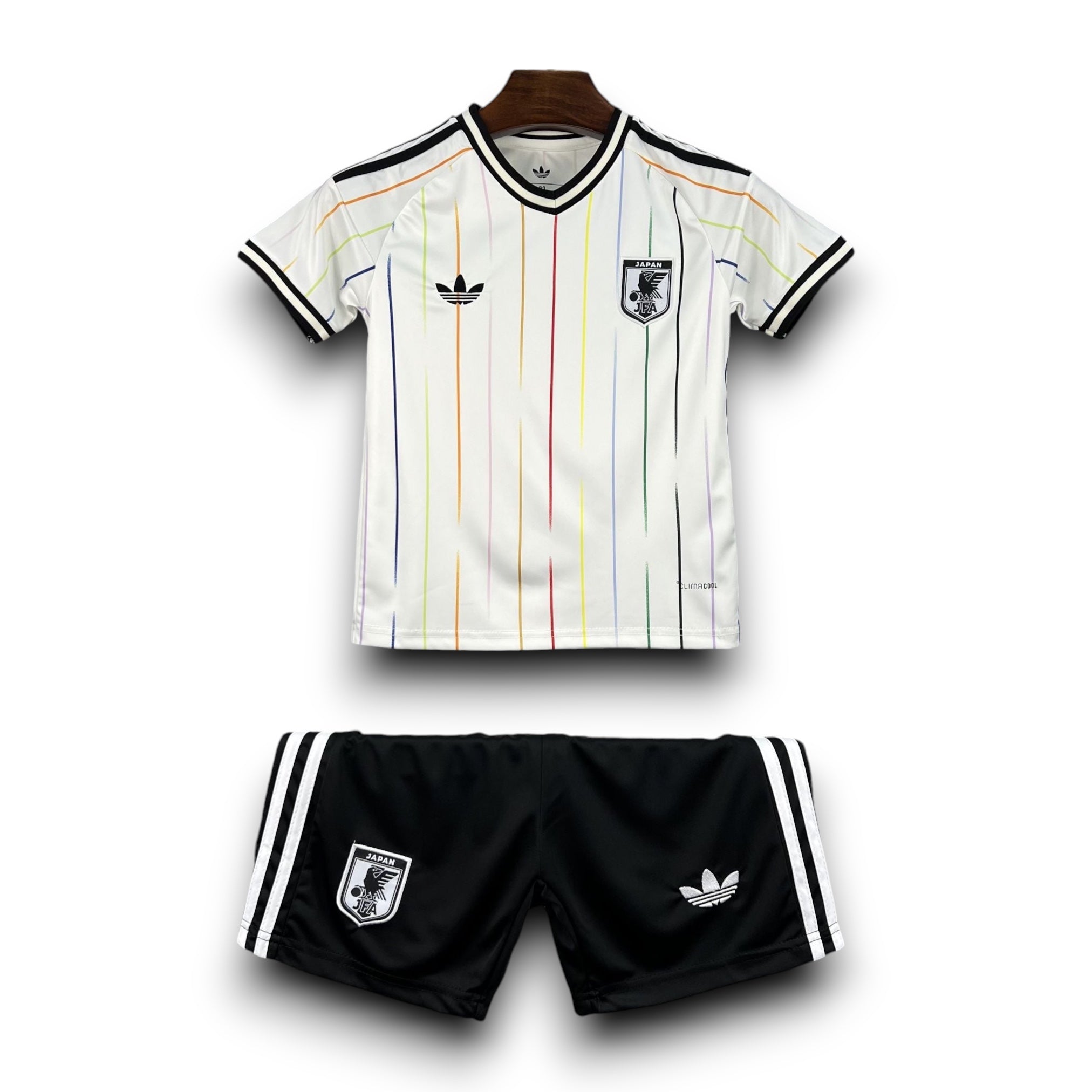 Leazofoot Japan 2026 kids outdoor soccer kit featuring a white jersey with rainbow pinstripes and black shorts.