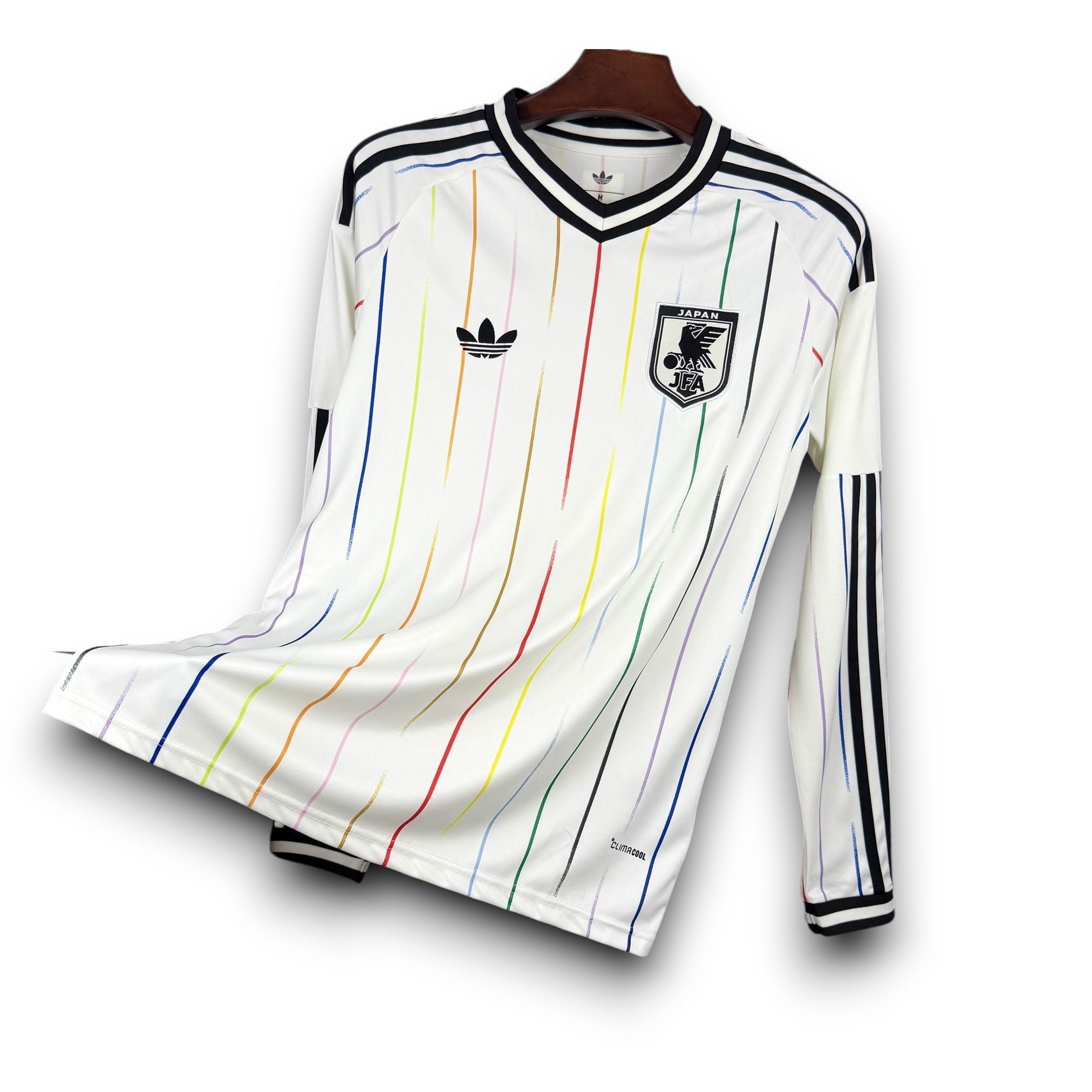 Leazofoot white long sleeve Japan soccer jersey with rainbow stripe pattern and black Adidas stripes on sleeves.