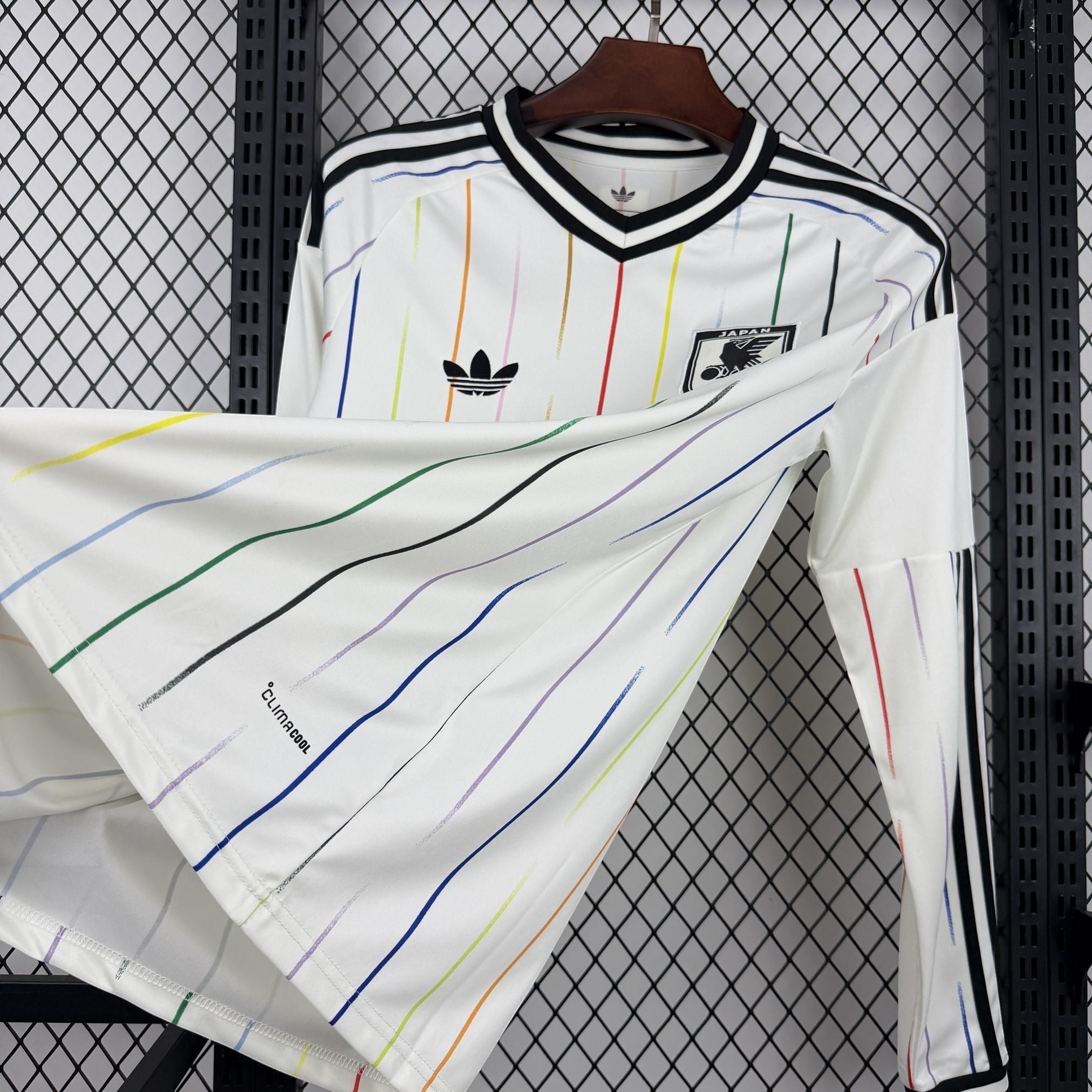 Leazofoot Japan long sleeve soccer jersey with rainbow stripes and black trim.