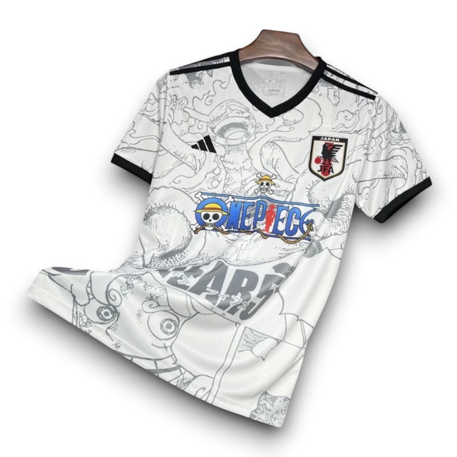 Leazofoot Japan 2024 concept soccer jersey featuring One Piece manga graphics, white base with black trim and JFA crest.