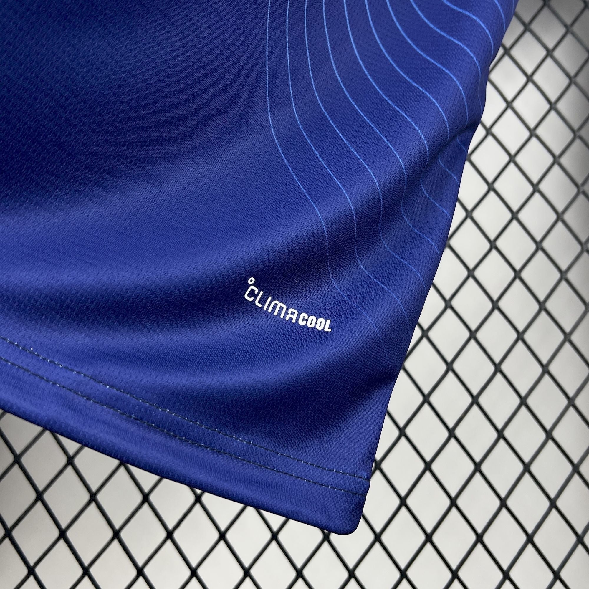 Leazofoot JAPON - MAILLOT DOMICILE 2026 blue polyester jersey with Climacool technology and subtle wave pattern.