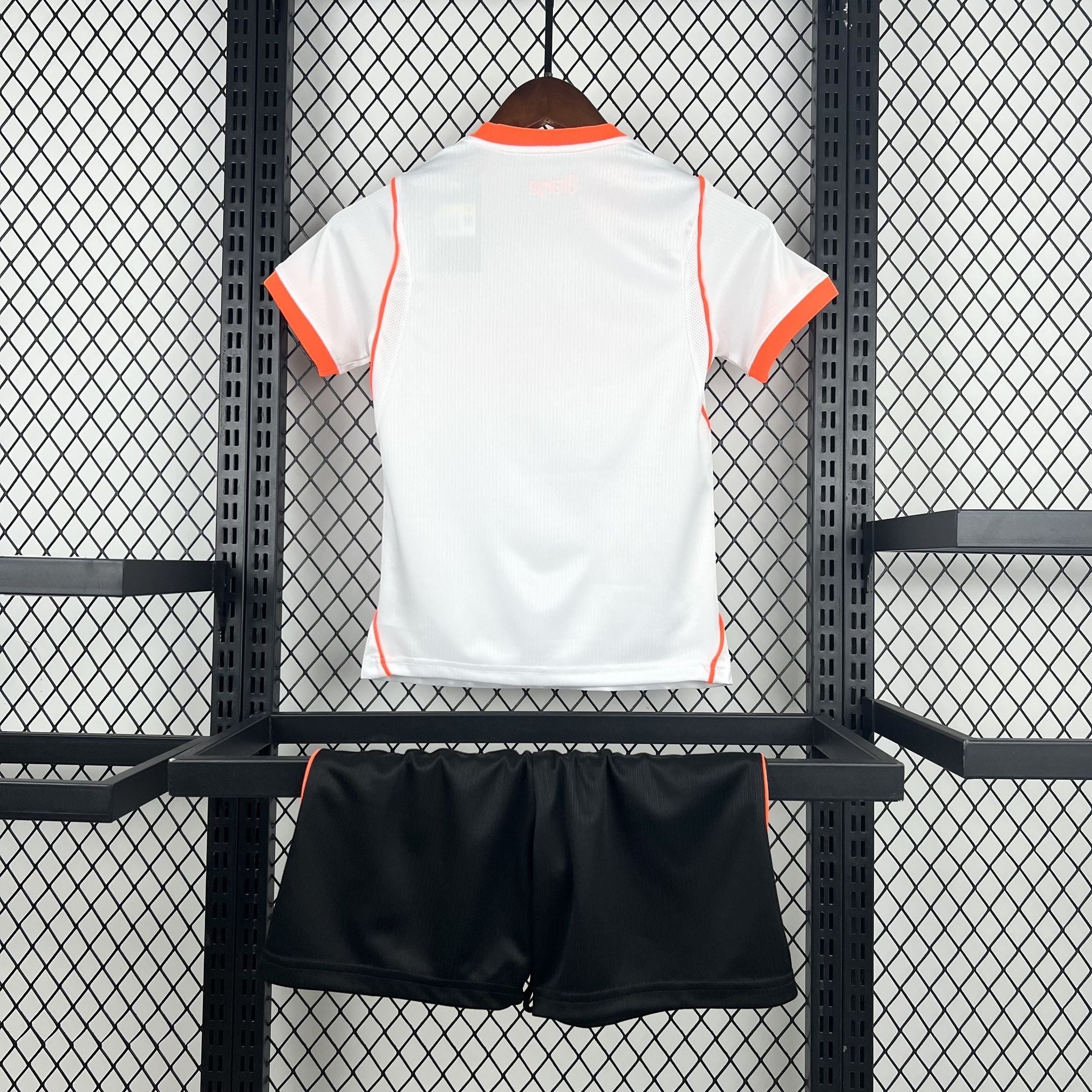 Leazofoot white t-shirt with orange trim and black shorts, kids' outdoor sports set.