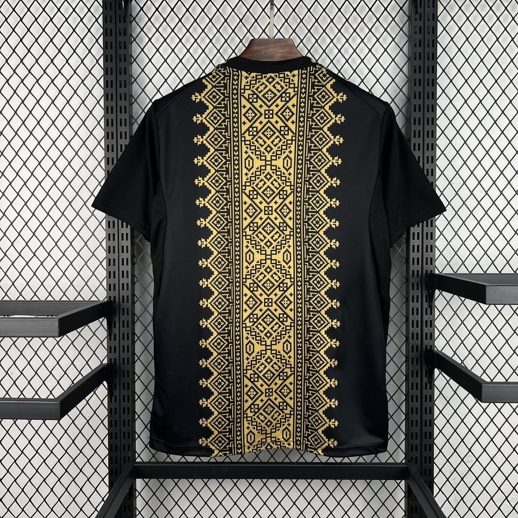 Leazofoot Maroc 2026 concept football jersey in black with a vertical gold geometric Moroccan pattern on the back.