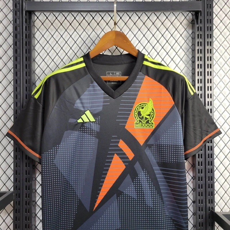 Leazofoot 2010 Mexico away soccer jersey in black with orange and lime green geometric pattern and team crest.