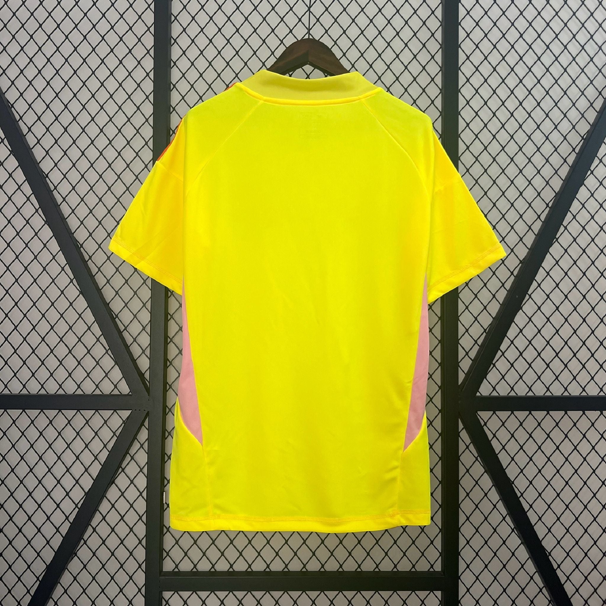 Back view of the Leazofoot Mexico 2024 goalkeeper jersey in bright yellow with pink side panels.